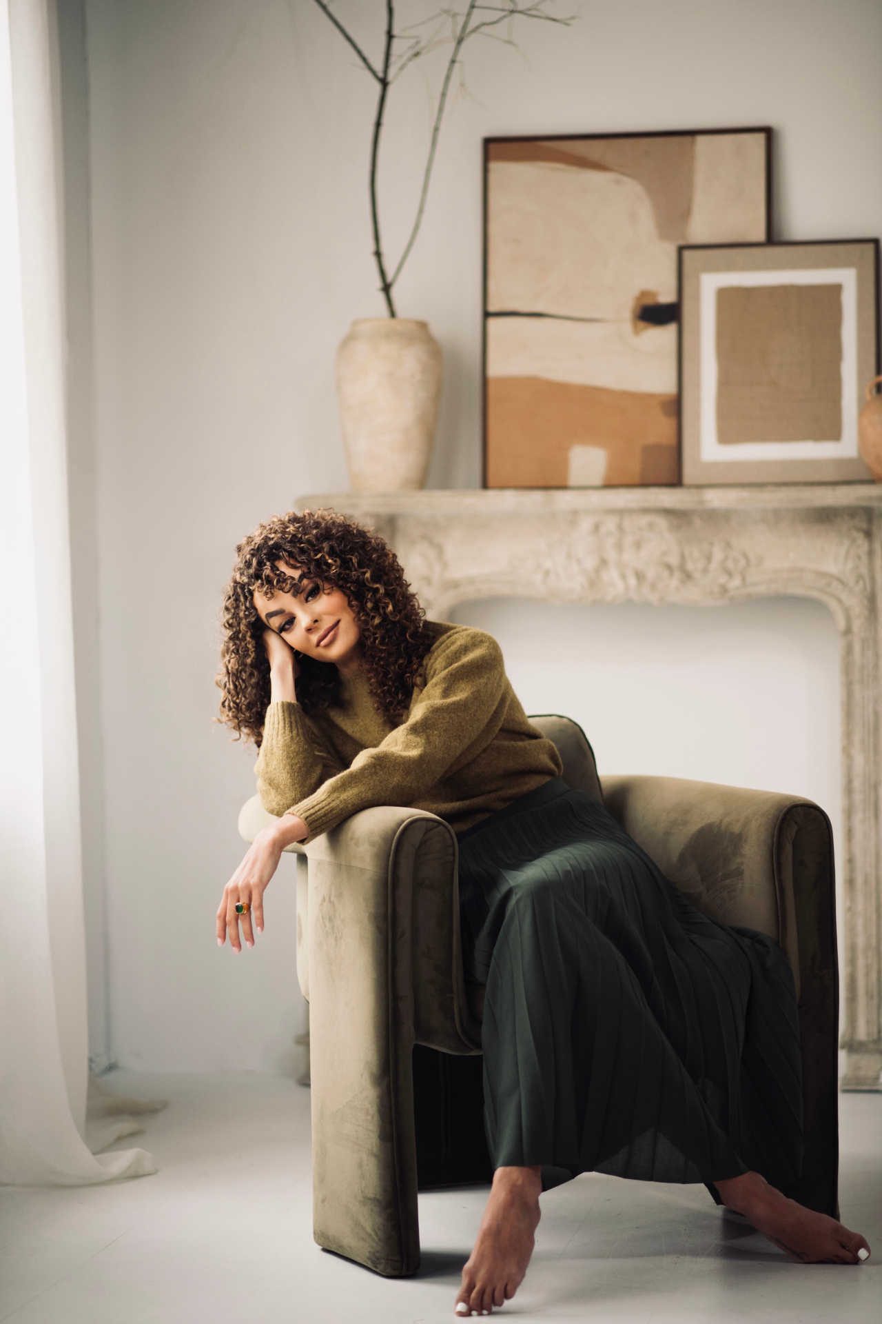 Portrait of Liz Gray, founder of TUNED MVMNT, in soft natural light.